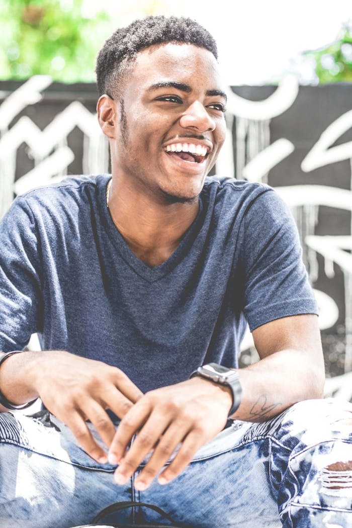 Laughing Man Wearing Gray V-neck T-shirt